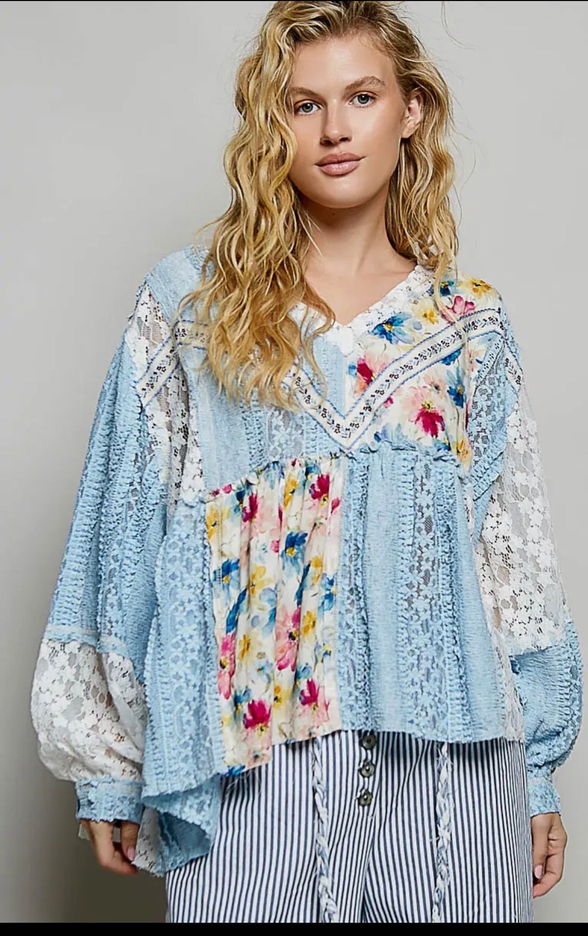 Blue lace with ruffle and lace patch top