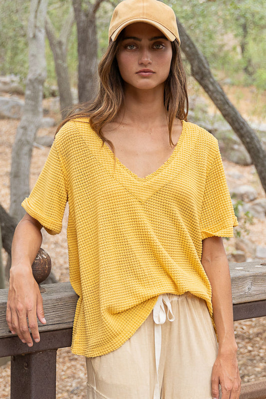 Relaxed fit in 1/2 sleeve v-neck thermal fabrication top IN BLACK AND MUSTARD