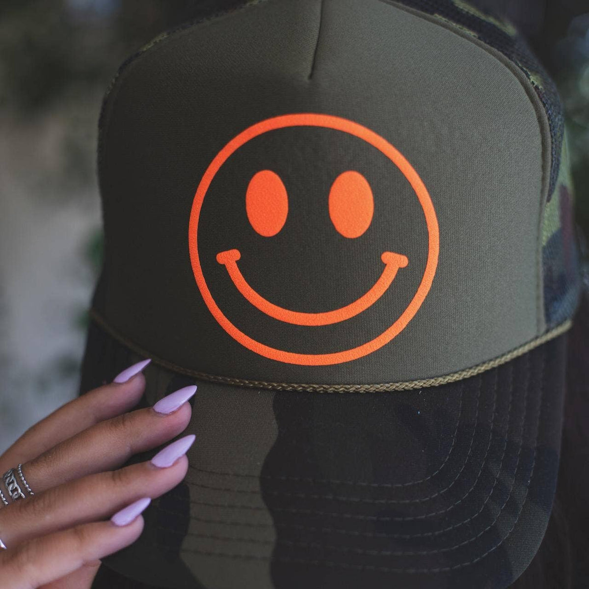 Otto Camo Trucker Hat with Orange Happy Face