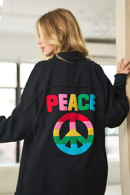 PEACE FRINGE HEM TOP IN BLACK